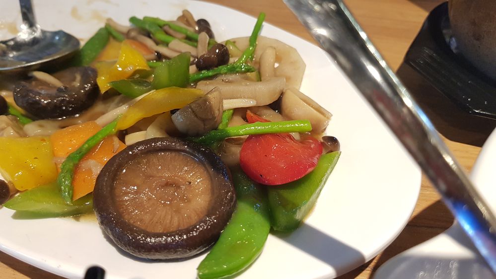 Stir fried lotus with assorted veg and mushrooms