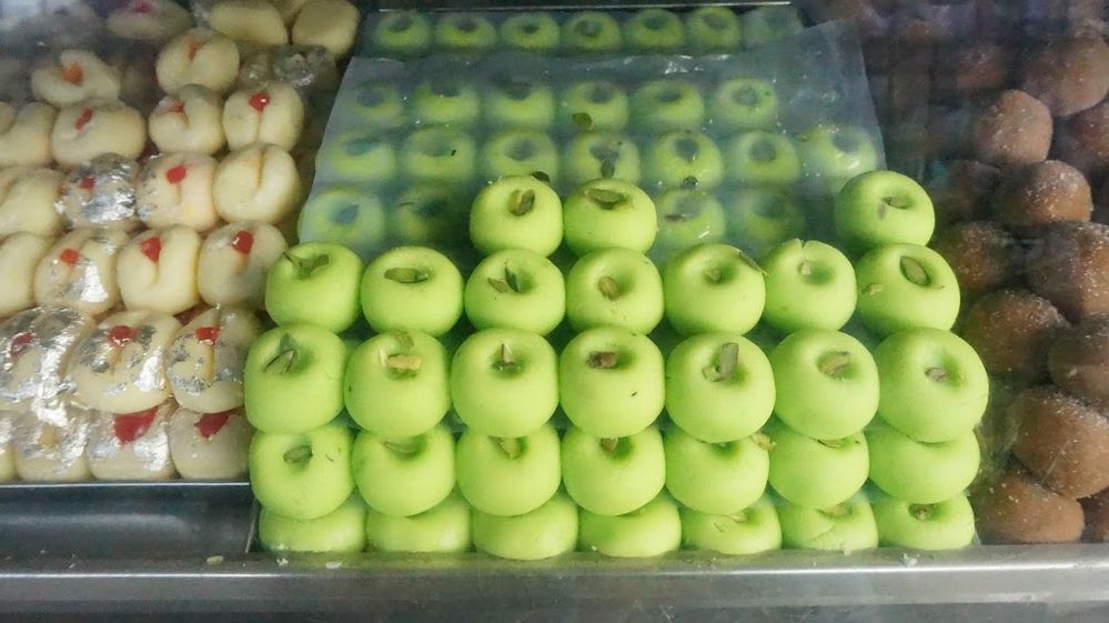 Caption: A photo of Turkish desserts displayed in a case. (Local Guide @MahabubMunna)