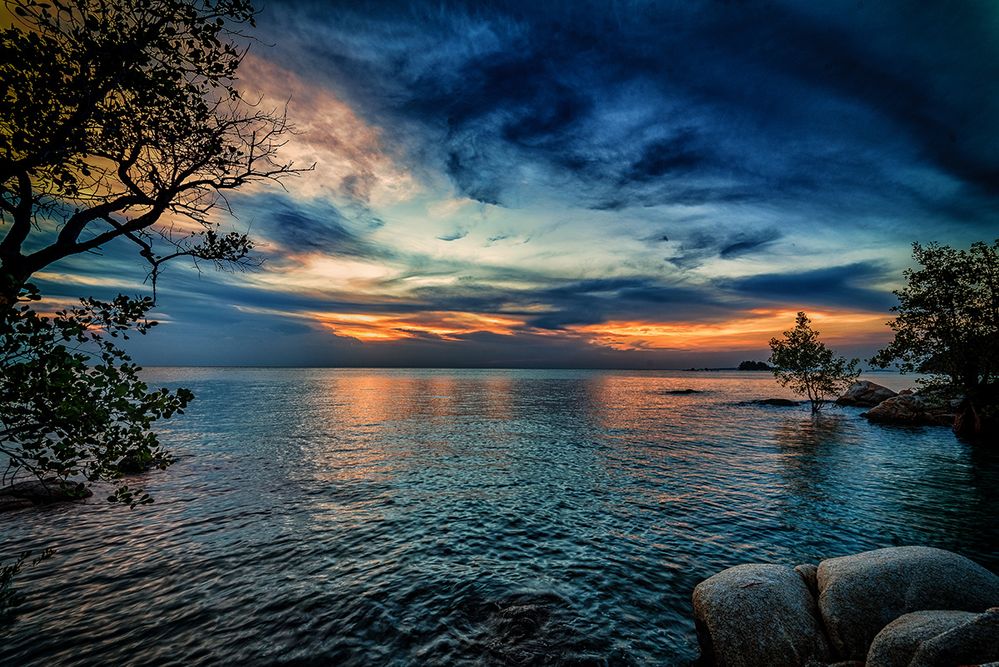 Caption: A photo of Pantai Pelawan at sunset. Riau Islands, Indonesia. (Local Guide Alberto Bellini)