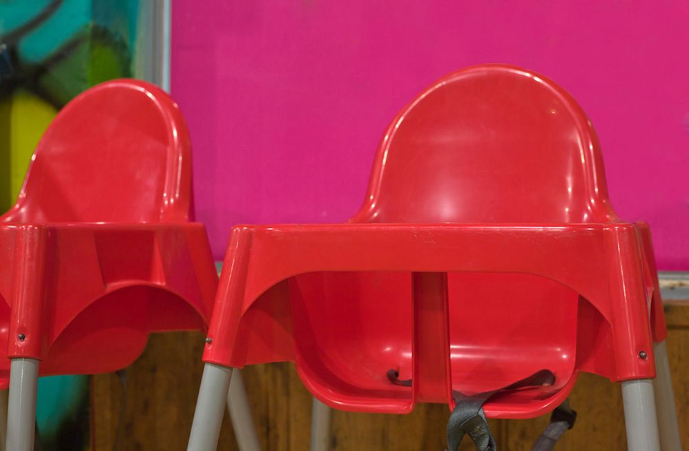 Caption: A photo of two red high chairs. (Getty Images)