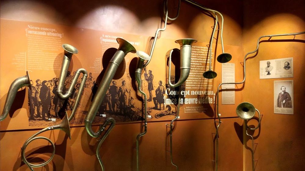 Caption: A photo of a saxophone exhibition at Maison Adolphe Sax in Dinant, Belgium. (Local Guide @TSS)