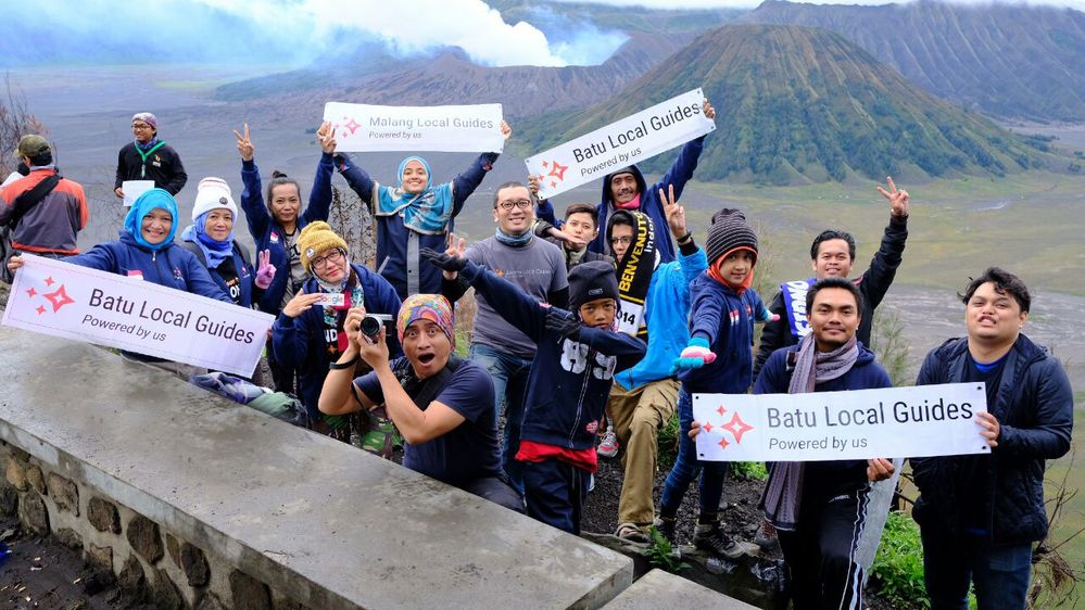 the couple and Local Guides in front of Mount Bromo