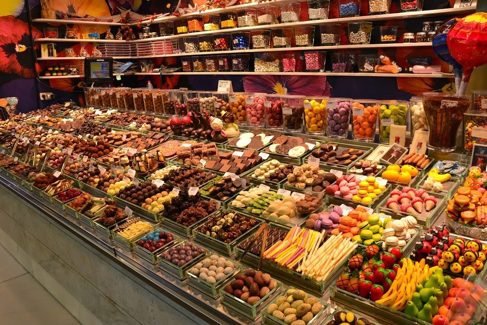 Caption: A photo of chocolates, candies, and other sweets on display at La Boqueria in Barcelona, Spain. (Local Guide Галина П)