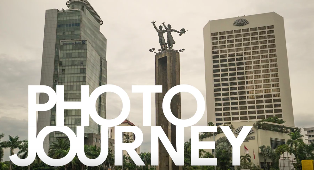 Caption: A screenshot from a Local Guides YouTube video featuring part of the Jakarta skyline overlayed with the text “Photo Journey.”