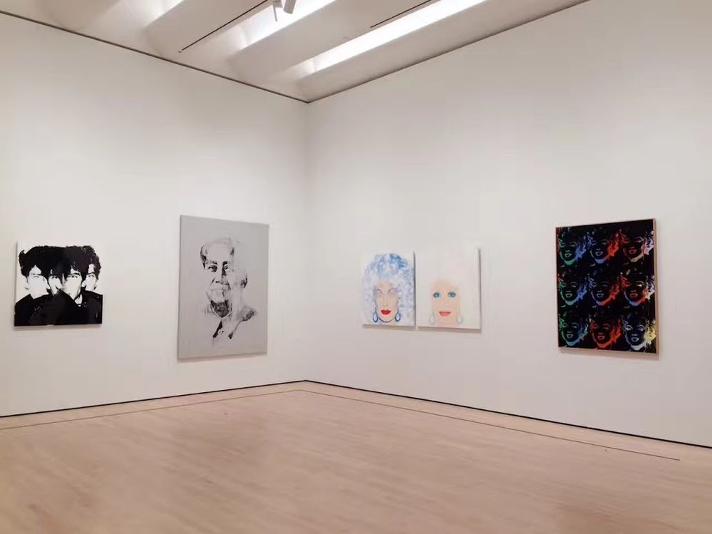 Caption: A photo of four Andy Warhol works at SF MoMA: “Robert Mapplethorpe,” “Mao,” “Dolly Parton,” “Andy Warhol Nine Marilyns [Reversal series].” (Local Guide Wes Swank)