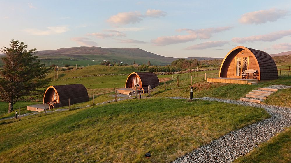 Caption: A photo of bunkhouses in the countryside at The Cowshed Boutique Bunkhouse in Isle of Skye, Scotland. (Local Guide Renee Hanenberg)