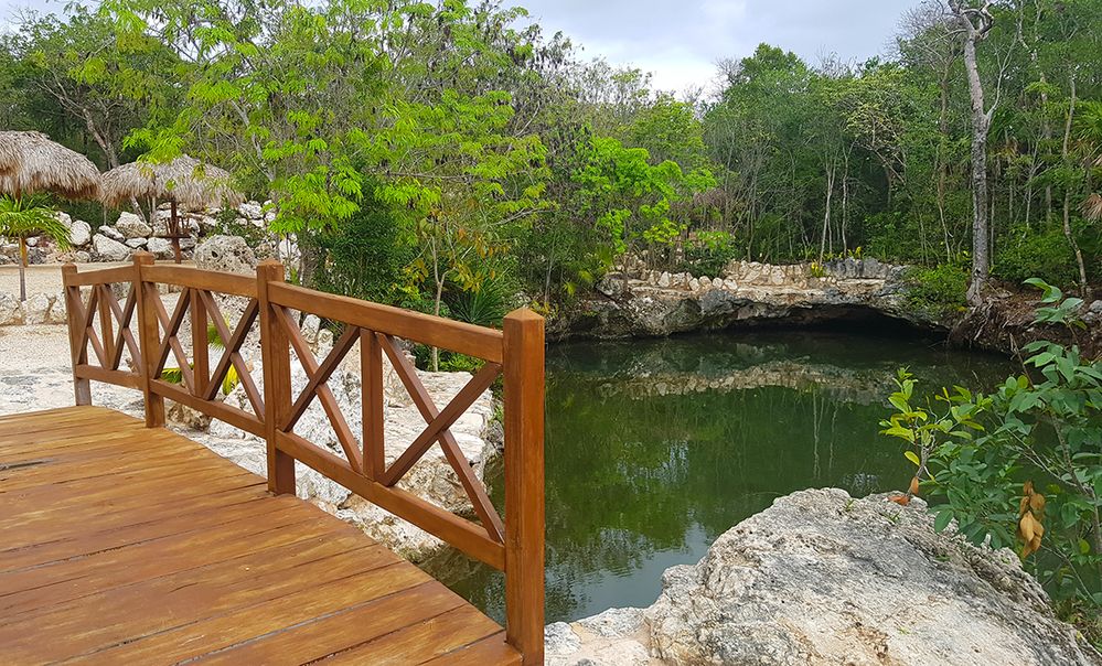 Caption: A photo of a footbridge over a cenote at Cenote Yax-kin in Cancun, Mexico. (Local Guide Jose Antonio Reyes Rivero Borrell)
