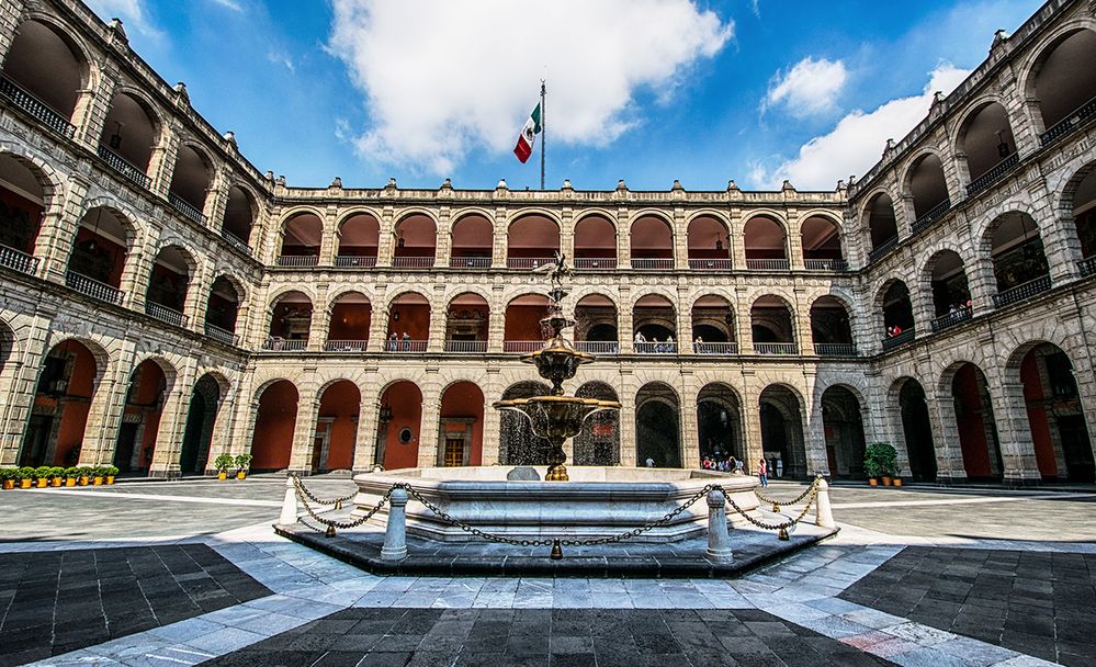 Caption: A photo of the fountain and exterior of Palacio Nacional, Mexico City, Mexico. (Local Guide Carlos Borja)