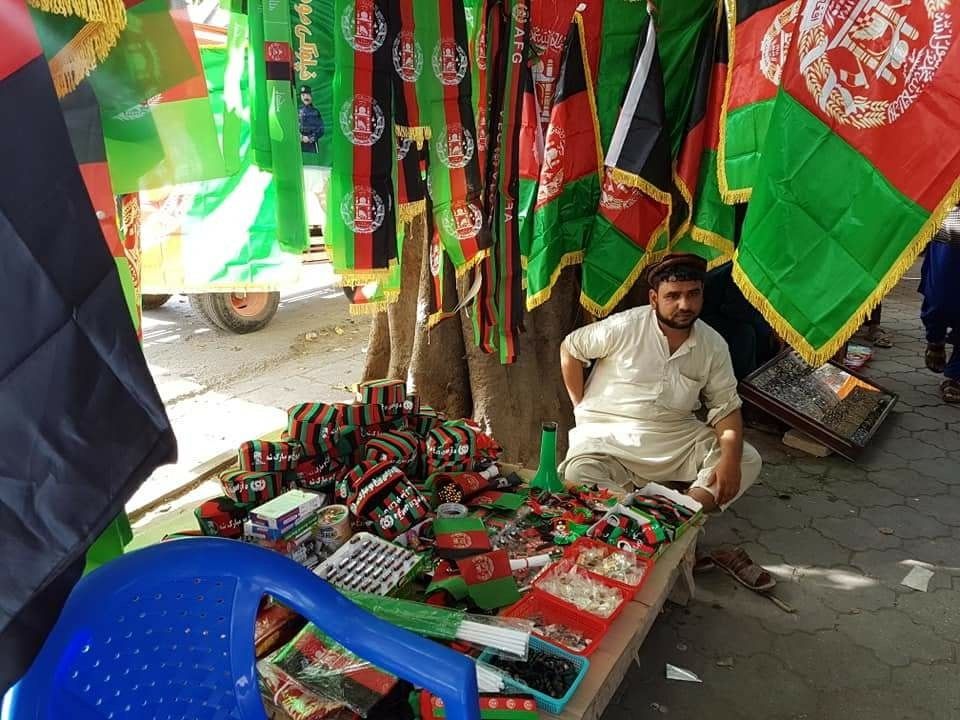 A man selling the National Flags