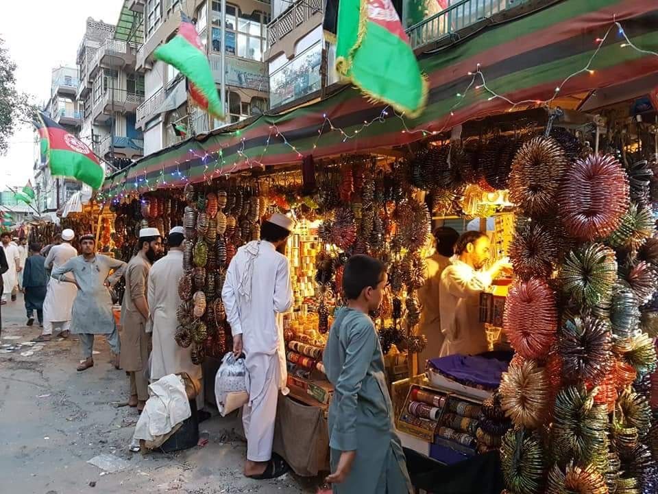 People buying cosmetics for EID