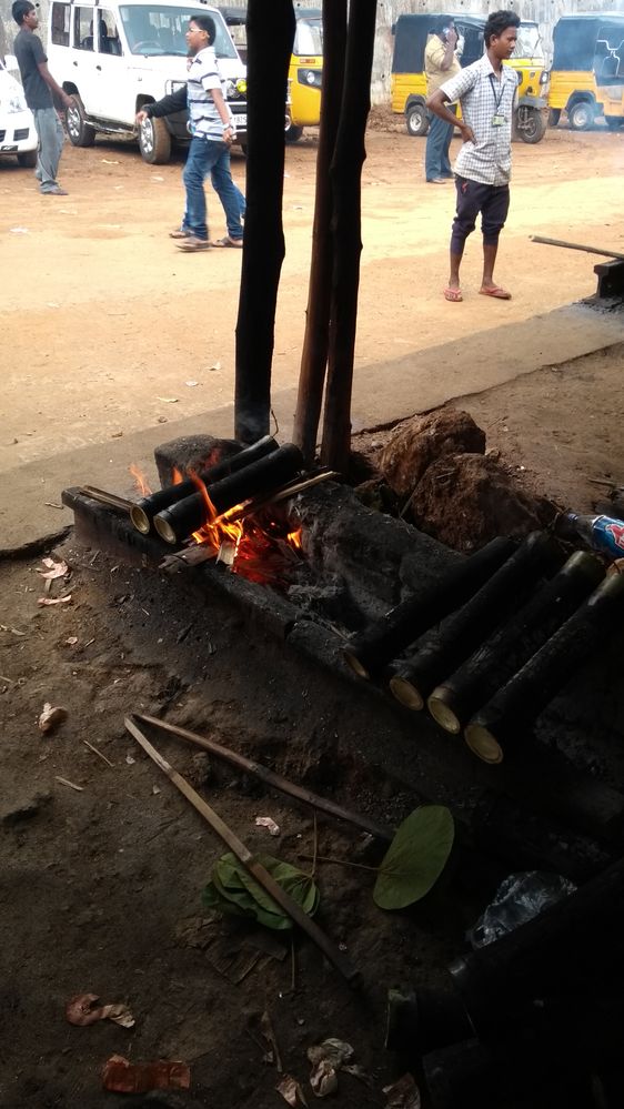Preparation of Bamboo chicken, an Indian tribal food.