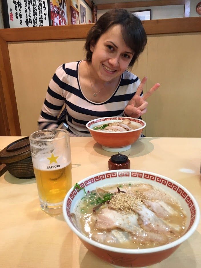 Caption: A photo of me while eating delicious ramen at small restaurant in Fukuyama city, Japan.