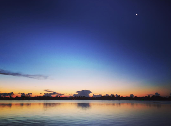 Caption: A photo of a sunrise over the intracoastal in West Palm Beach, Fla.