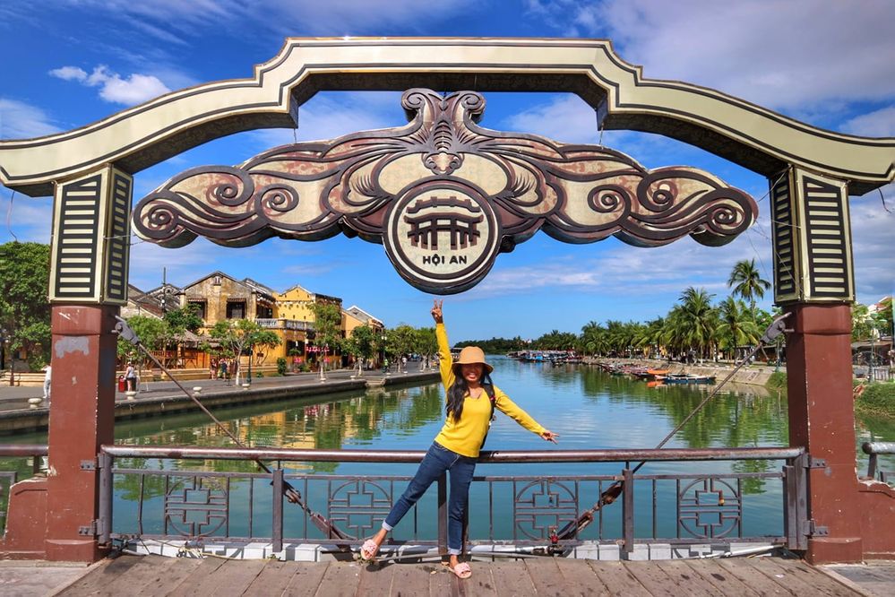 photo spot on the Japanese bridge with beautiful river views in Hoi An city in Vietnam