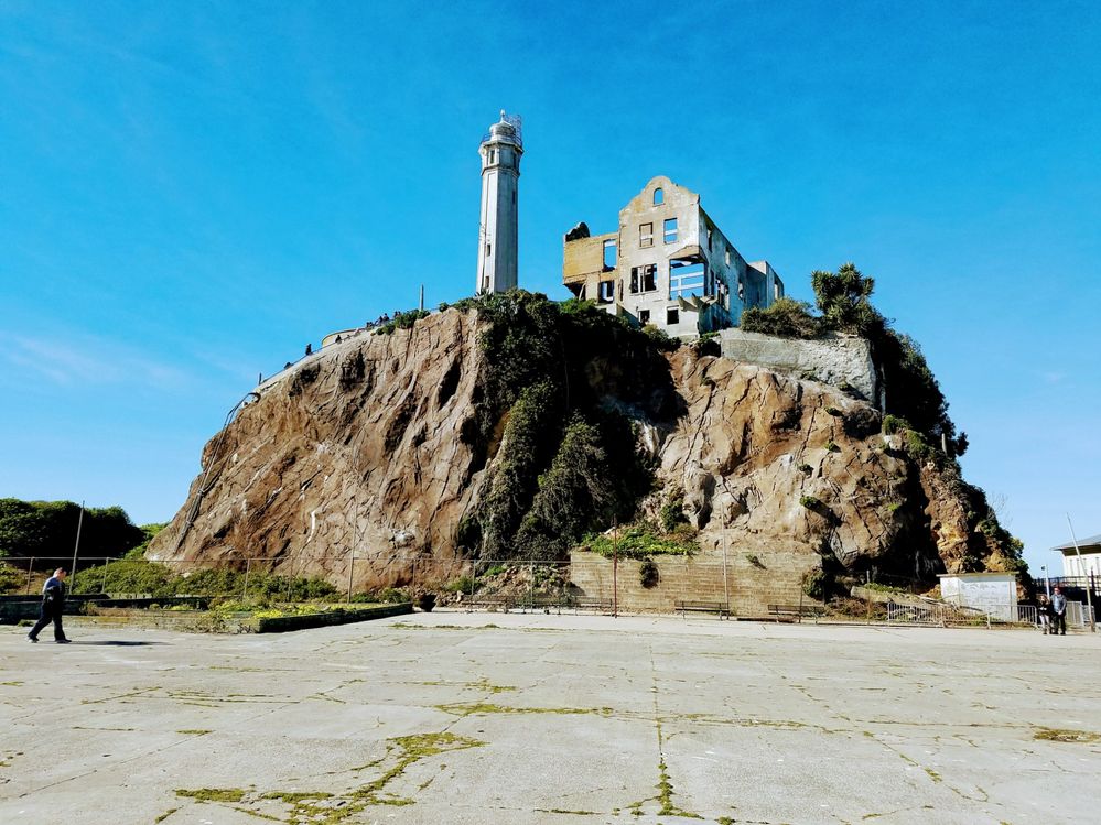 Caption: A photo of historical structures that remain on the rocky Alcatraz Island. (Local Guide Ramsey Midani)