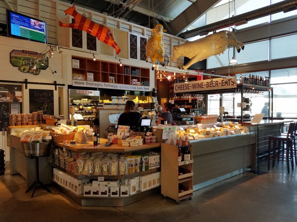 Caption: A photo of a cheese, beer, and wine shop at Oxbow Public Market. (Local Guide Angela Armagost)
