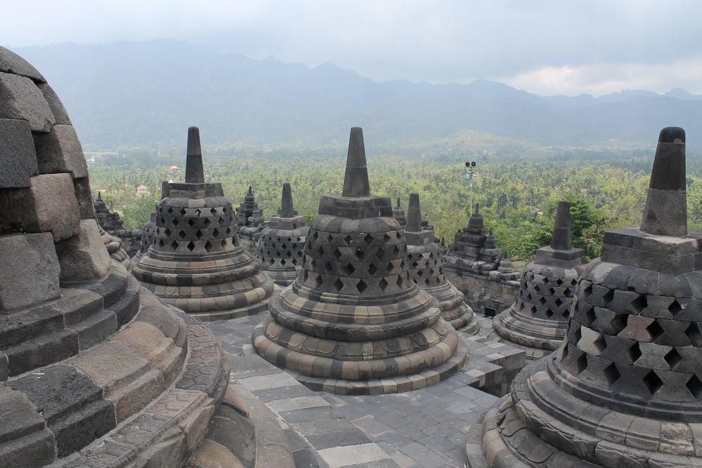 72 Buddha statues within a perforated stupa on the top