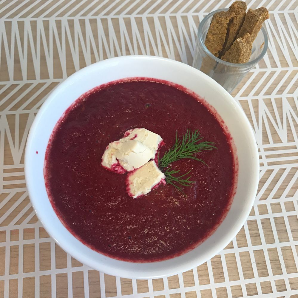 Caption: A photo of a beet soup in a white bowl at Loud in São Paulo, Brazil. (Local Guide Nanda Cury)