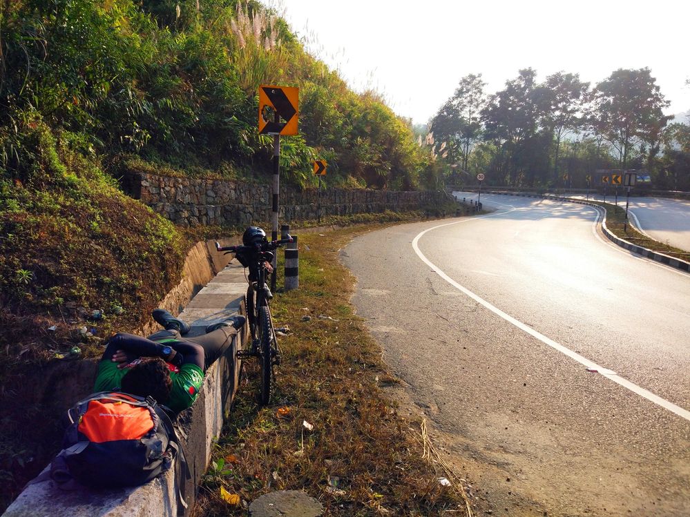Somewhere in Nongpoh hills I sleep besides the Highway due to Climbing Tiredness. lol