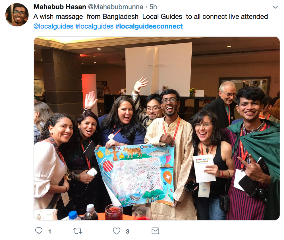 Caption: A Twitter post showing a photo of Local Guides holds up a handwritten message at Connect Live. (@Mahabubmunna)