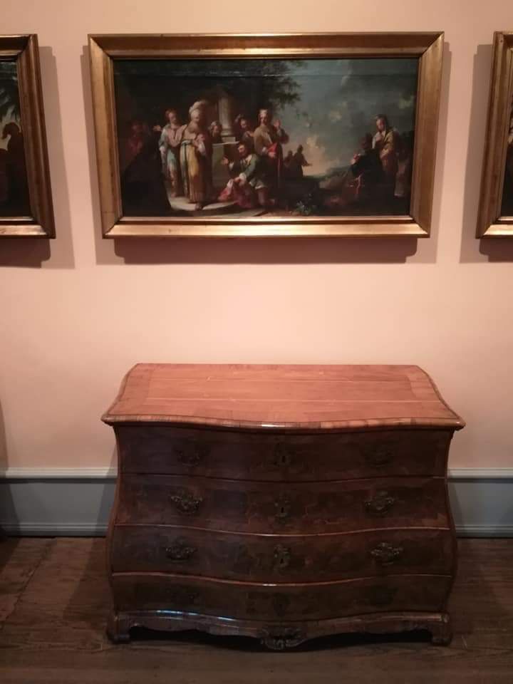 A table and painting on wall