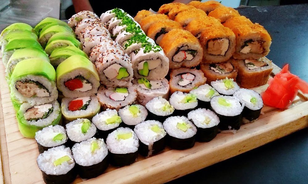 Caption: A variety of sushi on a wooden tray at Blue Ribbon Sushi in New York, New York. (Local Guide Maurizio Iori)