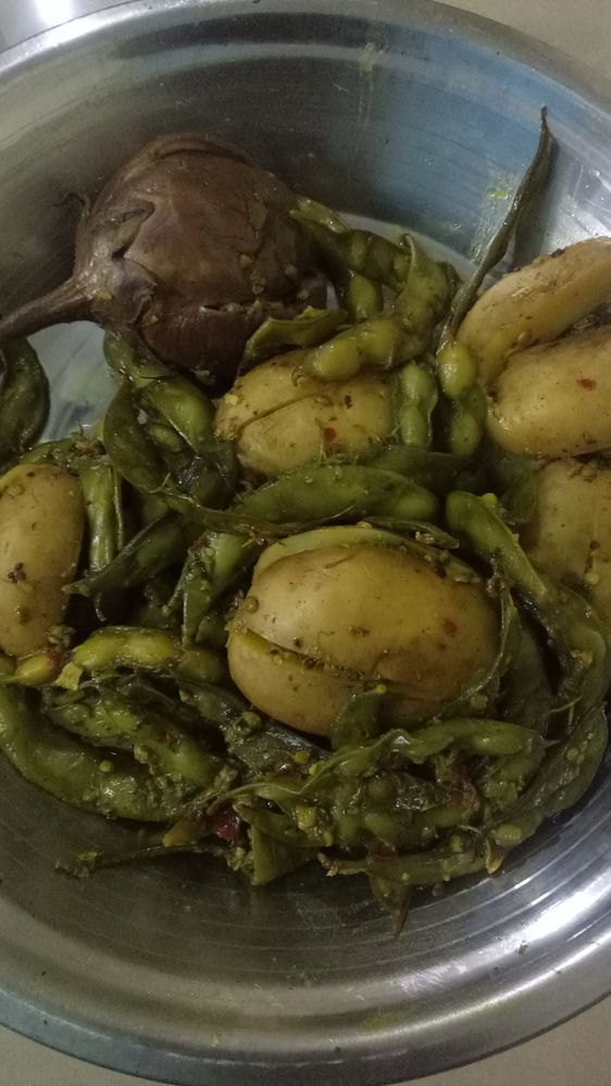 "Ubadiu" the famous only in west  Zone (South Gujarat Region) Mixed some spices  with Different Potato and other Vegetables used and make it in Pot  this taste you can never eat in other Part of India