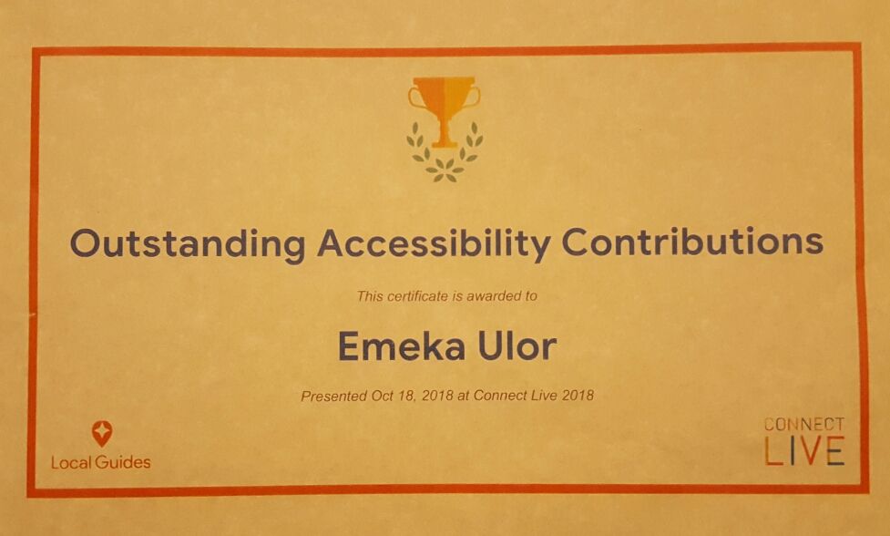 A certificate of Outstanding Accessibility Contributions presented to Emeka Ulor