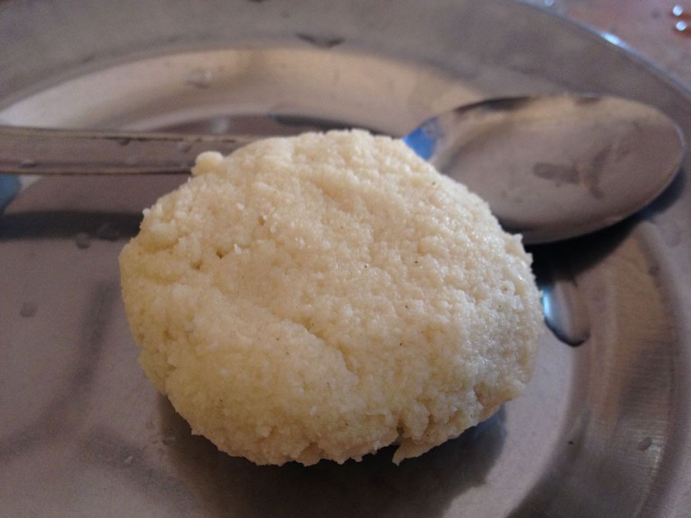 Monda, is a traditional sweetmeat. The sweet, first made in 1824, is reputed in the subcontinent of India and many countries for its originality, taste and flavour.  Ram Gopal Pal, better known as Gopal Pal, first prepared this sweetmeat in 1824. He offered it to Maharaja Suryakanta Acharya Chowdhury, one of the leading zamindars of Muktagacha. Maharaja Suryakanta was full of praise for Gopal Pal and encouraged him to prepare monda to entertain guests who visited the zamindars. The zamindars also extended financial support to Gopal Pal for the expansion of the business.  Now Sree Ramendranath Pal and Brothers run the business. They are the fifth generation of the Gopal Pal family.