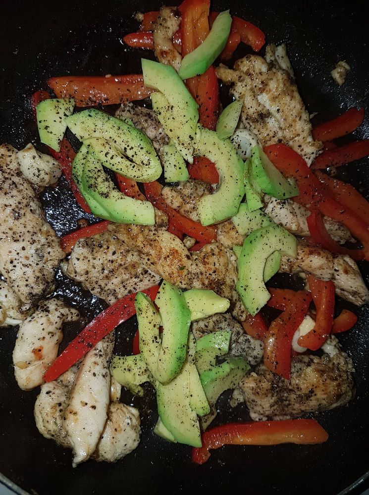 Chicken breasts with avocado, sweet red peppers and lots of spices