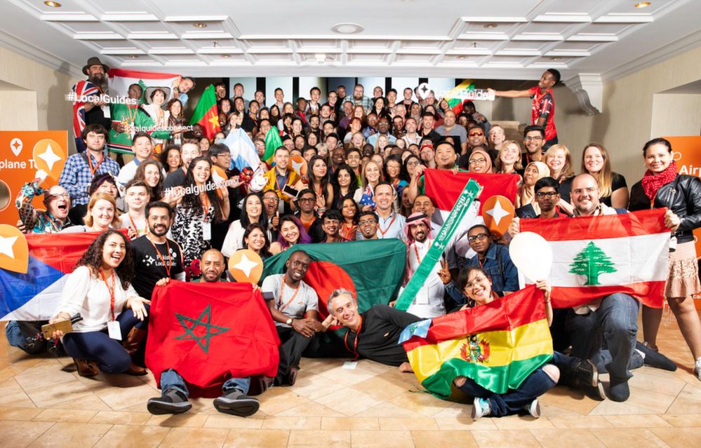 Caption: 151 Local Guides showing some national flags at Connect Live 2018 (Photo: Google)