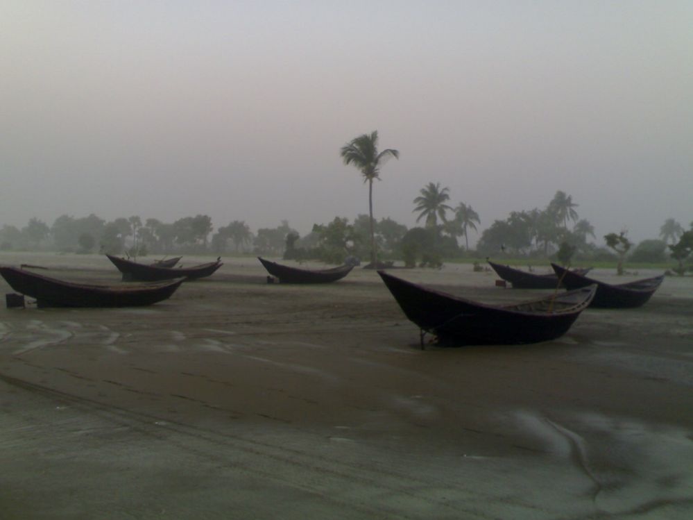 Idle fishing boats of local fishermen on beach