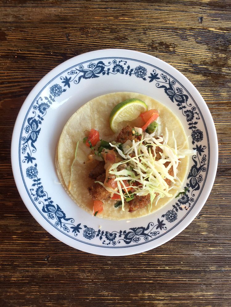 Caption: A photo of an open taco on a plate photographed using natural light. (Local Guide Wendy George)