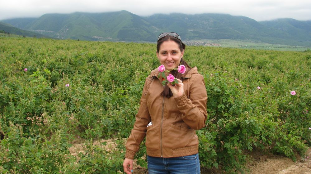 Caption: A picture of me taking my time to enjoy the rose fields