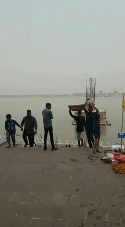 Carrying Holy  Water Of Ganges To Home For Worship