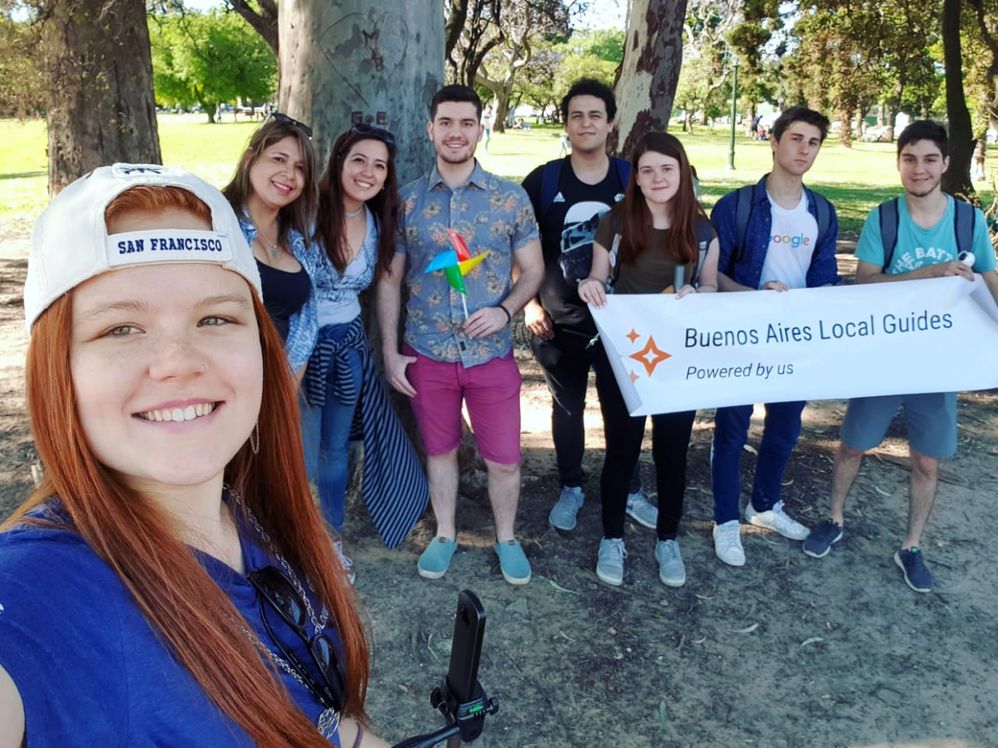 Caption: Selfie taken by me next to a couple of trees and seven motivated Local Guides. (From left to right: me, Ana, Natasha, Juan Cruz, Daniel, Jesi, Luciano, Santiago).