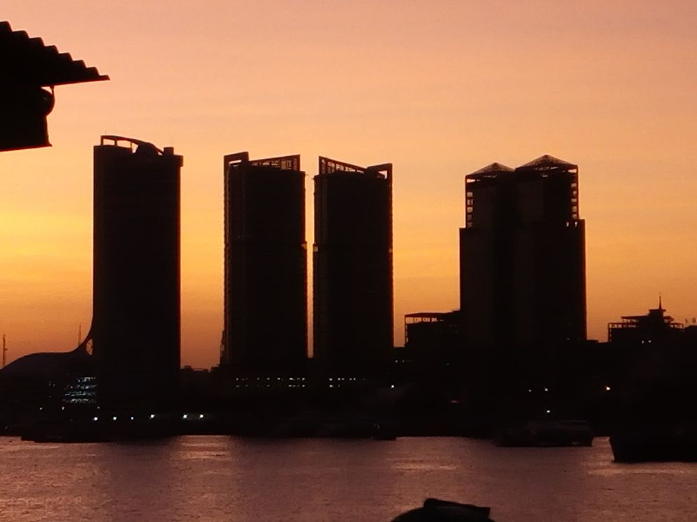 "the twin towers of Dar" at sunset