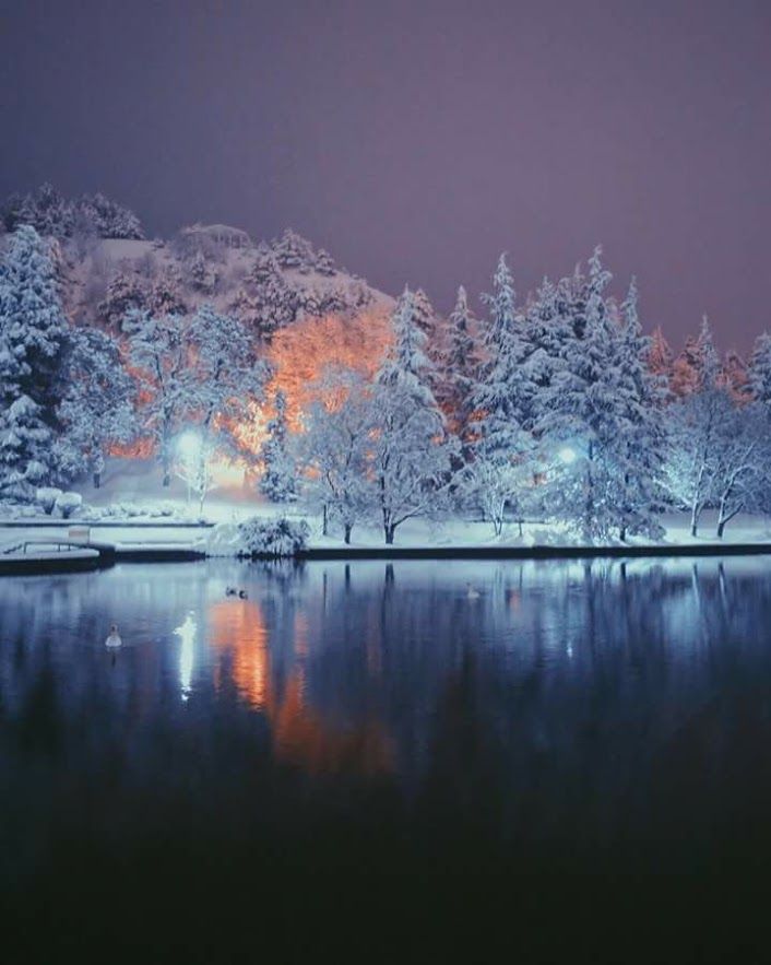 Caption: A photo of the same pond and mountain during winter. (Vasil Bakalov)