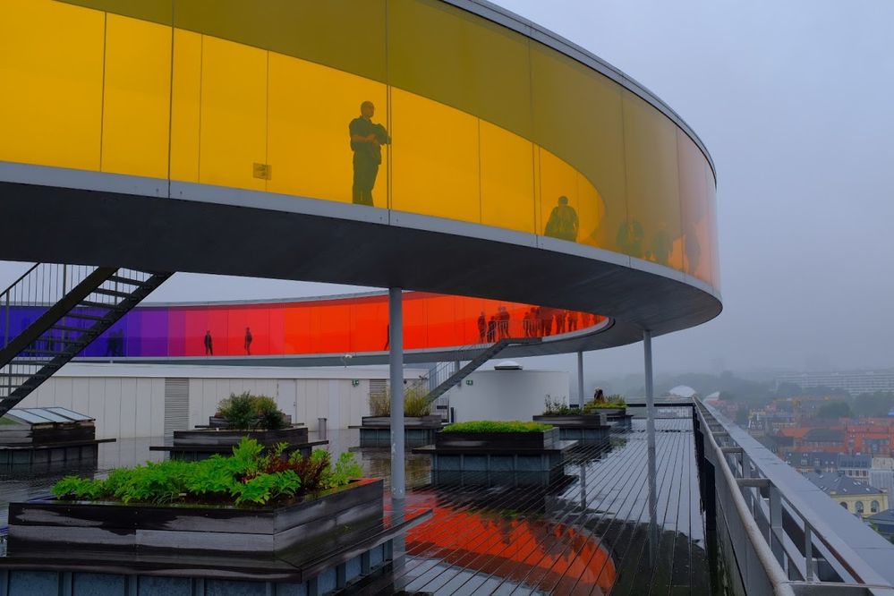 Caption: A photo of the exterior of a colorful walkway at ARoS Aarhus Art Museum taken on a rainy day in Aarhus, Denmark. (Local Guide Fernando Galán)