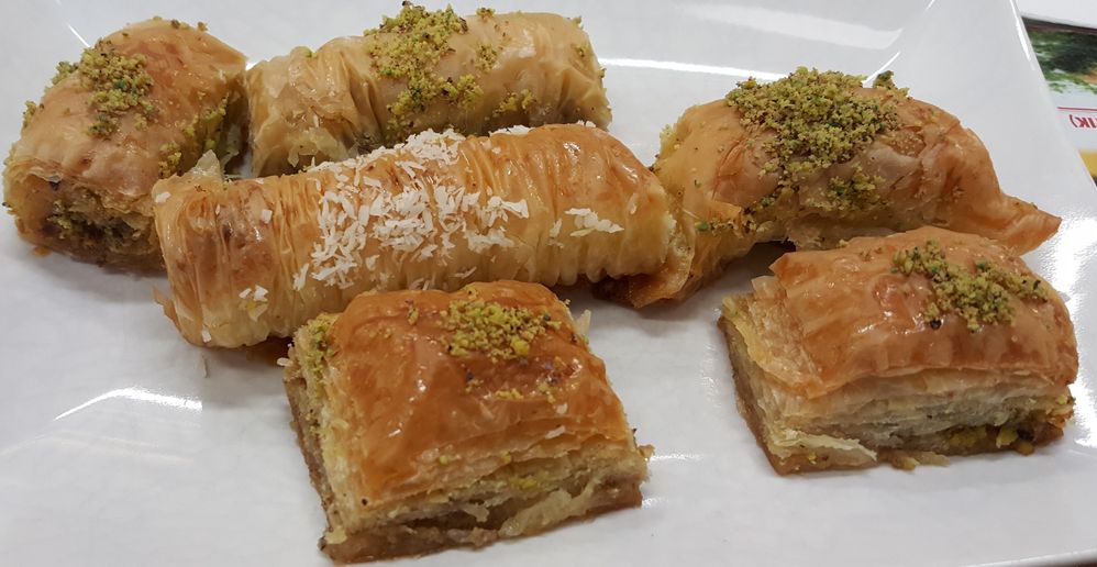 Caption: A photo of five pieces of baklava on a plate (Local Guide Spatedn Kumar)