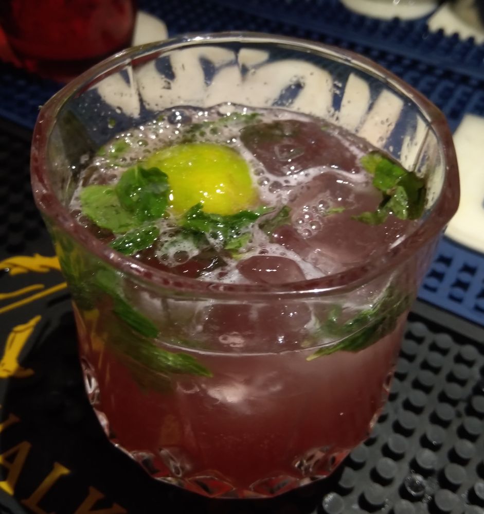 This is a mocktail with some mint leaves and lime