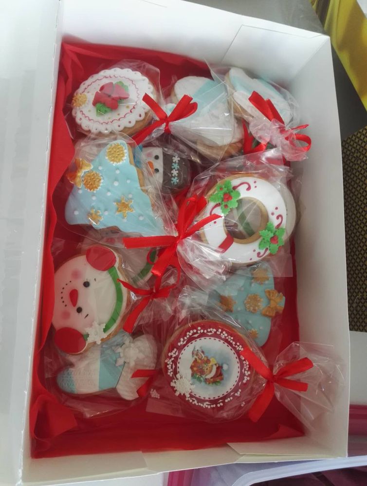 Caption: A photo of colorful Christmas biscuits in a box. (Local Guide @TsekoV)
