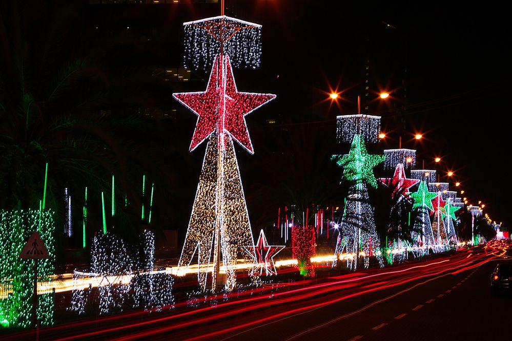 Caption: A photo of holiday lights in the shape of stars taken in the evening alongside a road in Lagos, Nigeria. (Local Guide Kyoto Dream Trips)