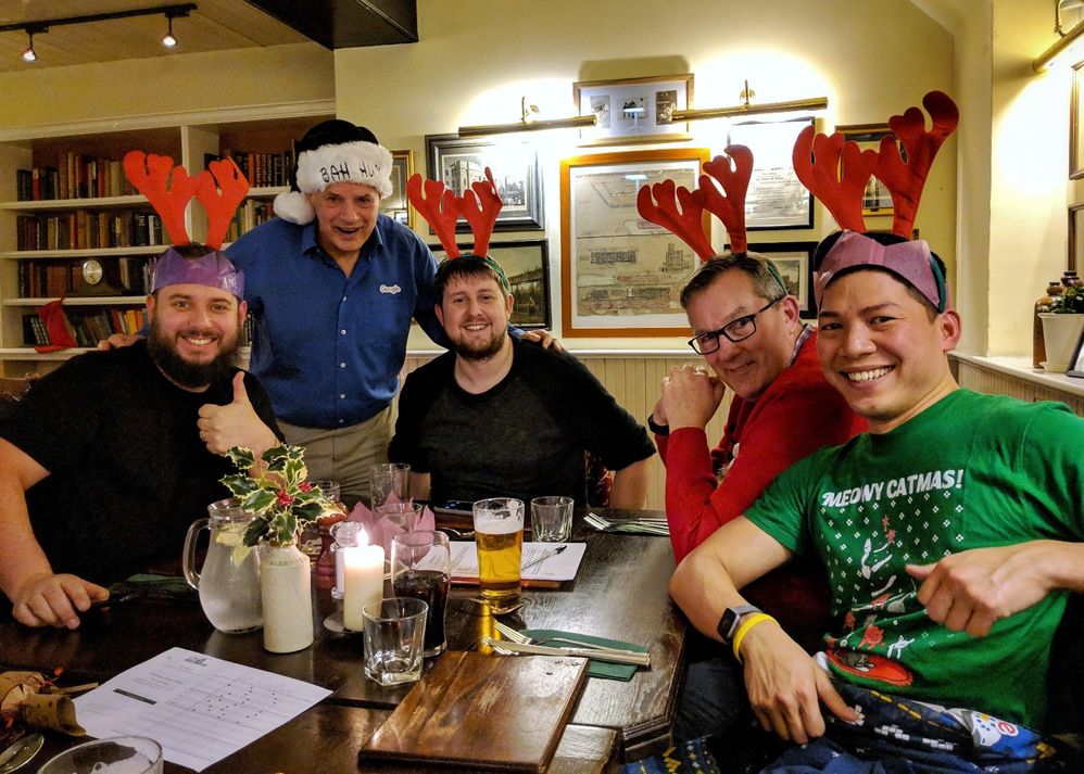 Caption: Team Reindeers comprising of (L-R) Alain, Iain (quizmaster), Tim, David, Adrian