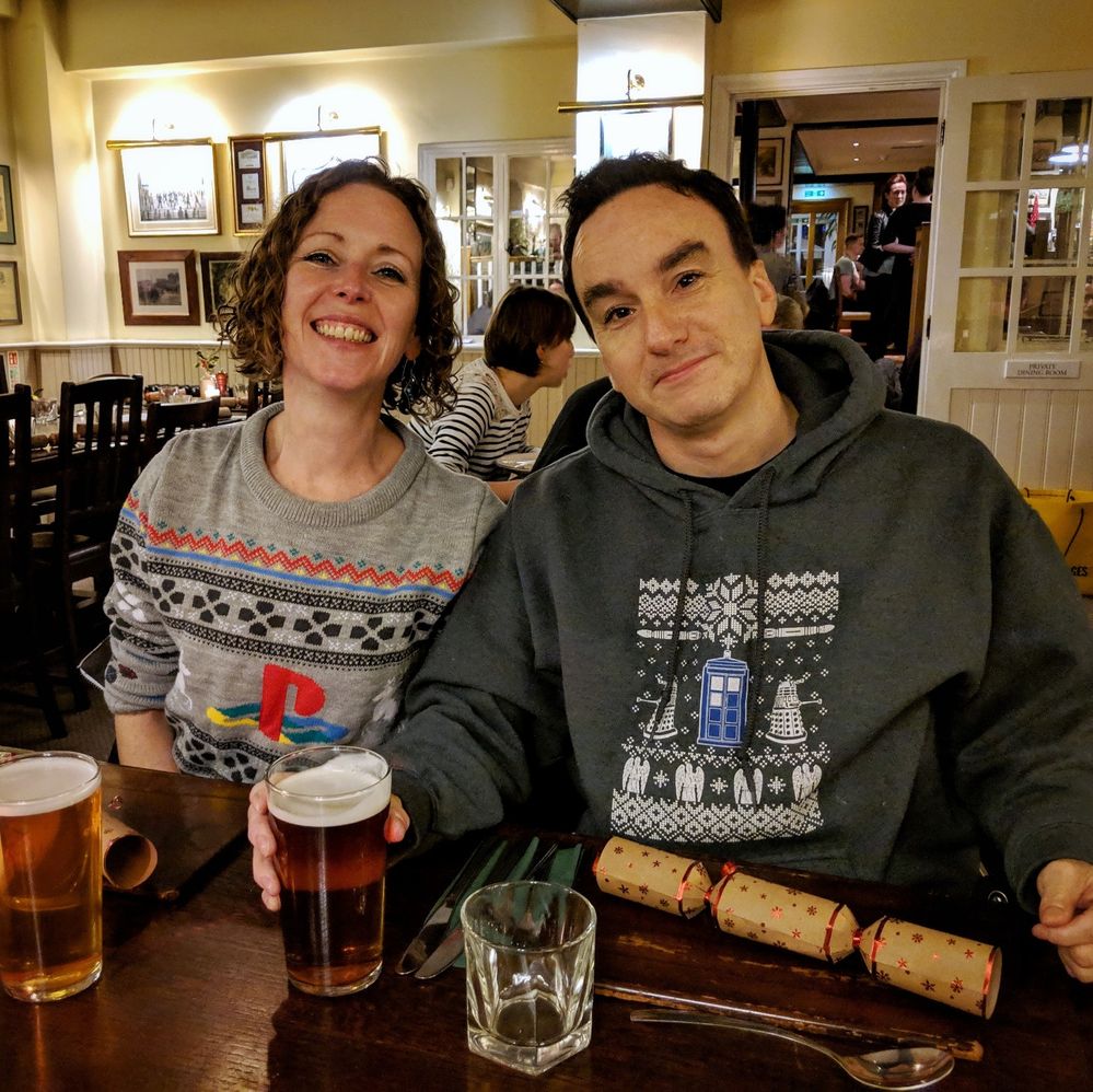 Caption: Zoe and Alan and their Christmas jumpers!