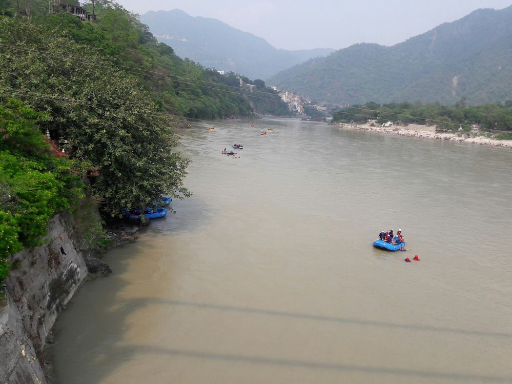 Visitors enjoying rafting in Ganga river, Rishikesh