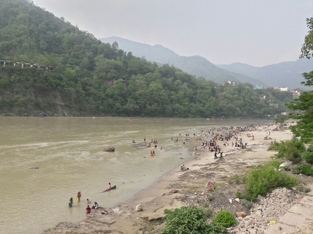 Pilgrimages taking bath in holy Ganga water