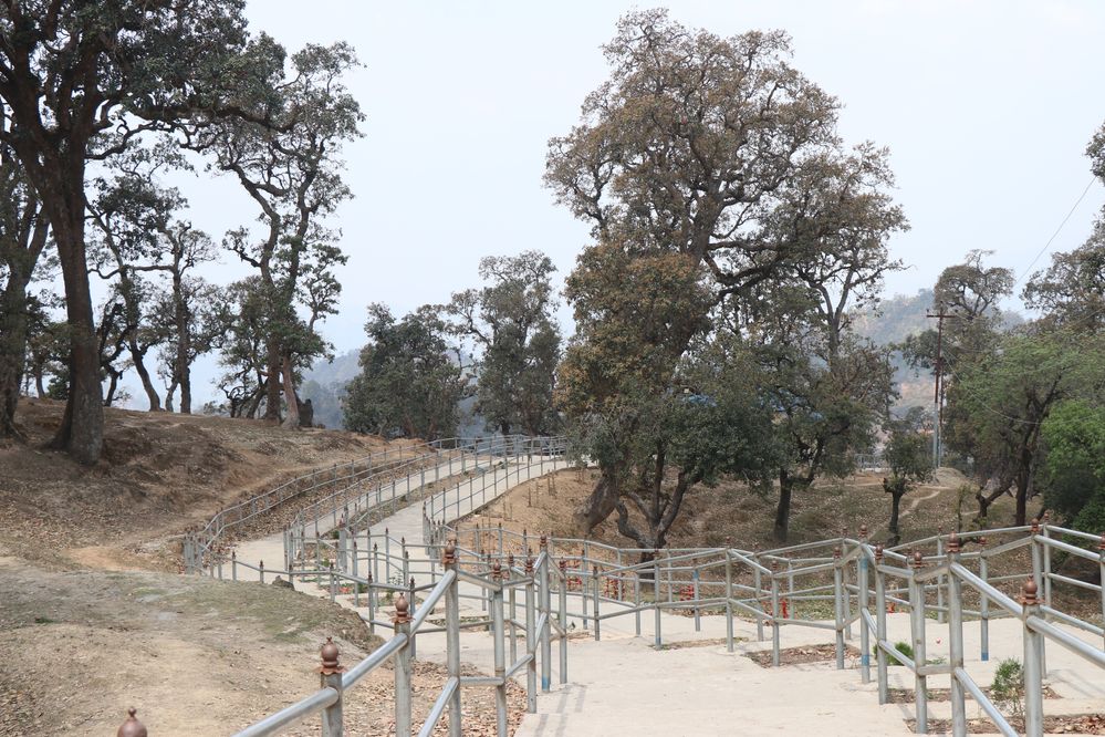 The steps to the Swargdwari Ashram begin at Dharmpani