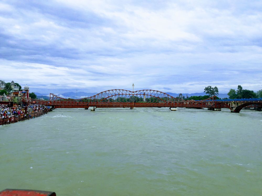 Caption: Iron bridge on the Ganga river at Har ki pauri, Haridwar, Uttarakhand