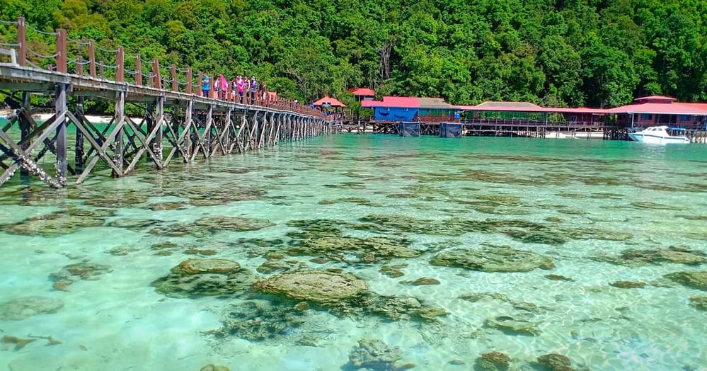 Beautiful Bohey Dulang Island. Clear crystal water.
